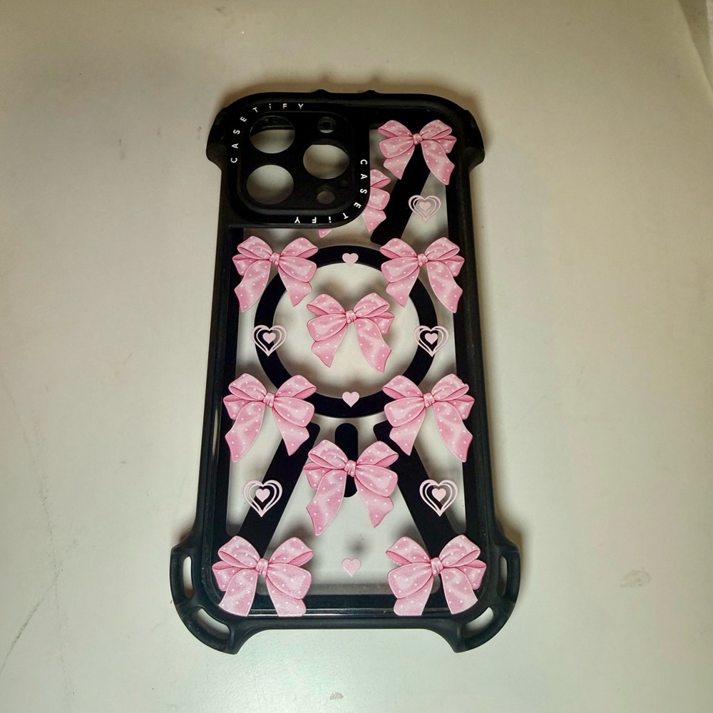 Casetify Black Case with Pink Bow Design